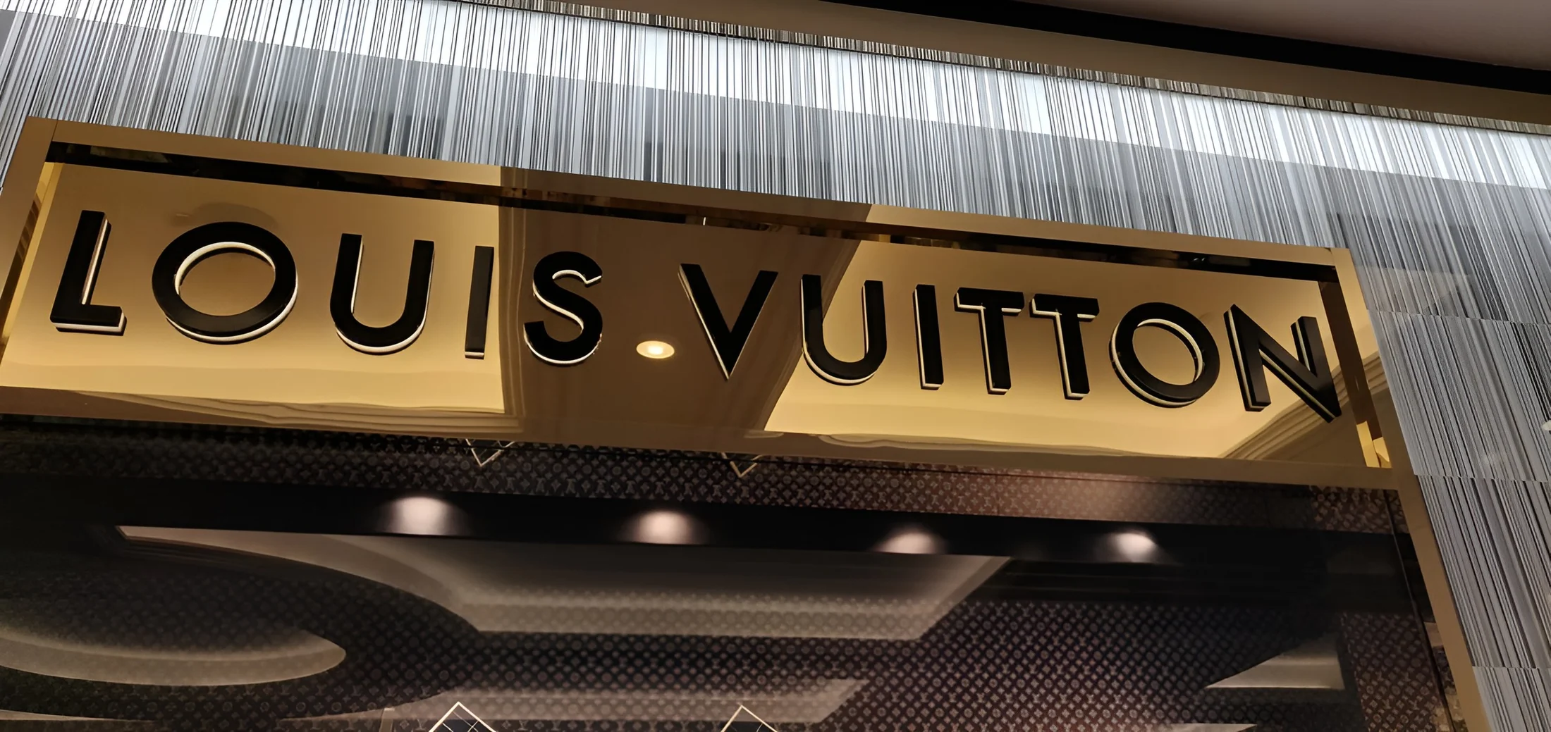 Louis Vuitton boutique sign