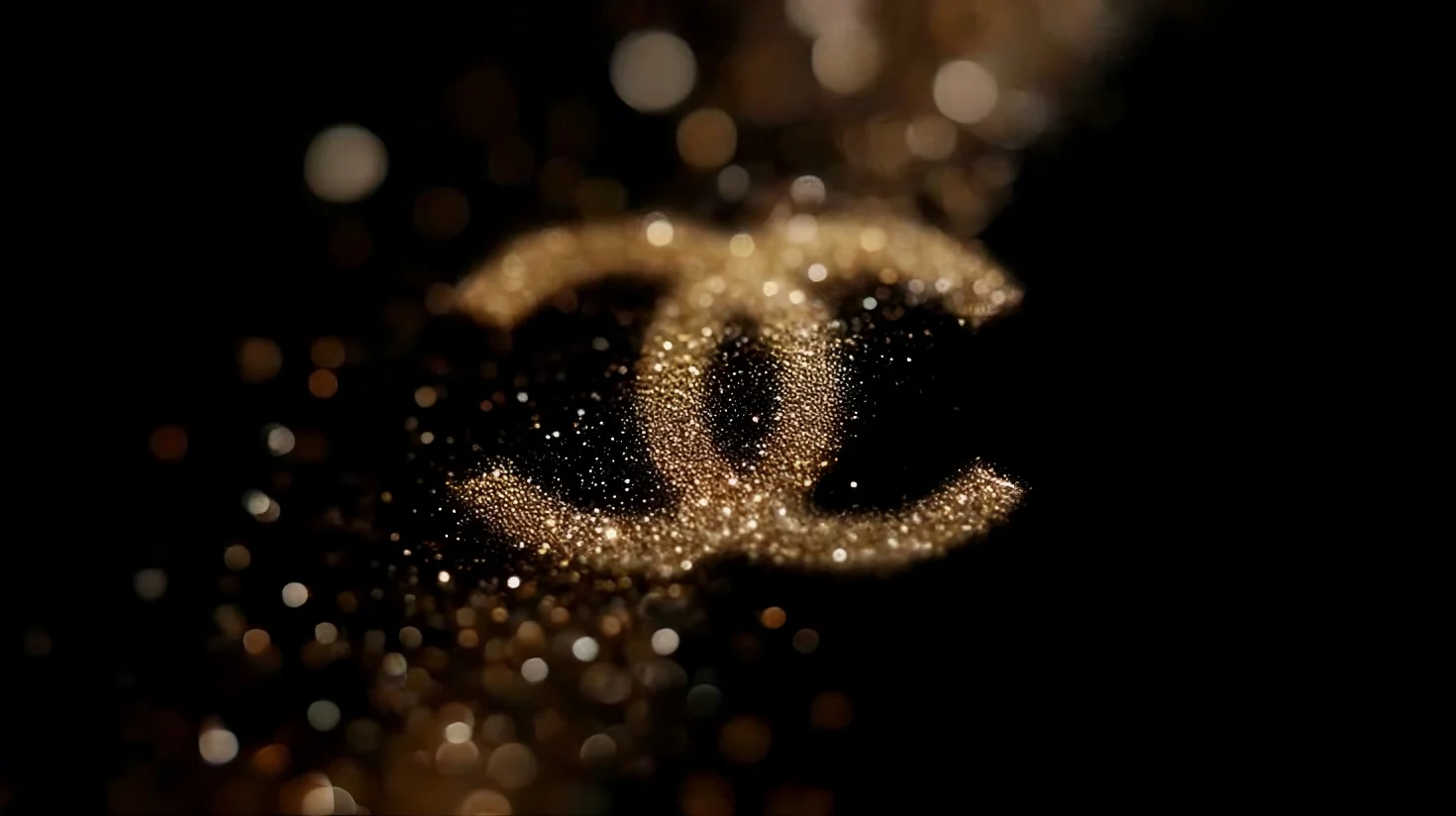 Golden double-C jewellery detail